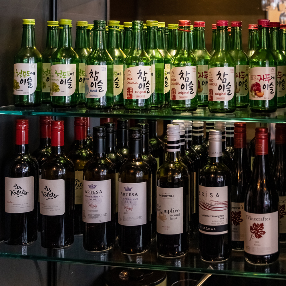 A row of soju spirit bottles