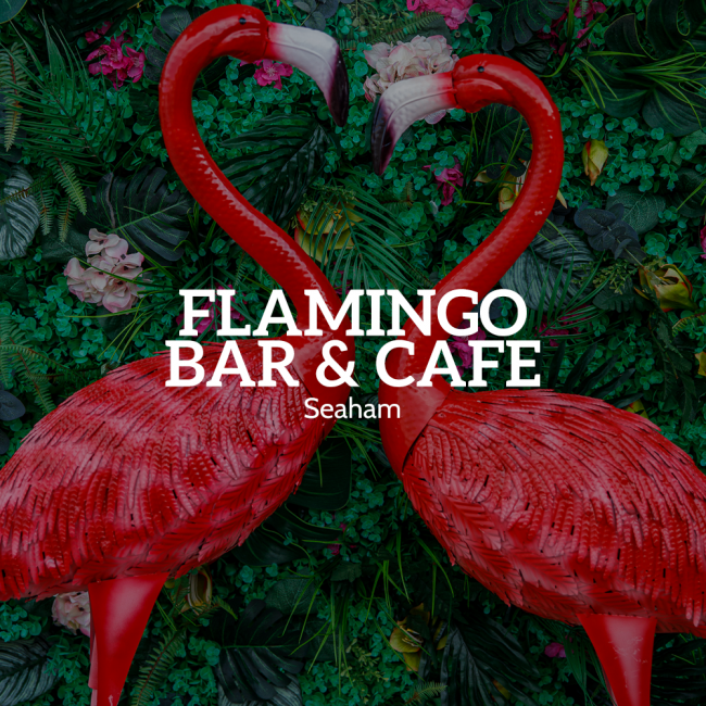 Two flamingo statutes at seaside cafe in Seaham